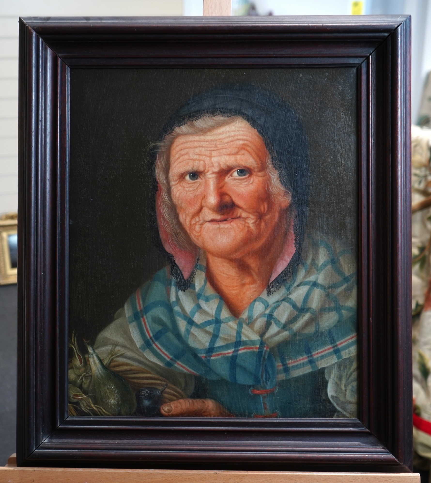 School of Pieter Snyers, Flemish 1681-1752, A portrait of an elderly woman wearing a bonnet